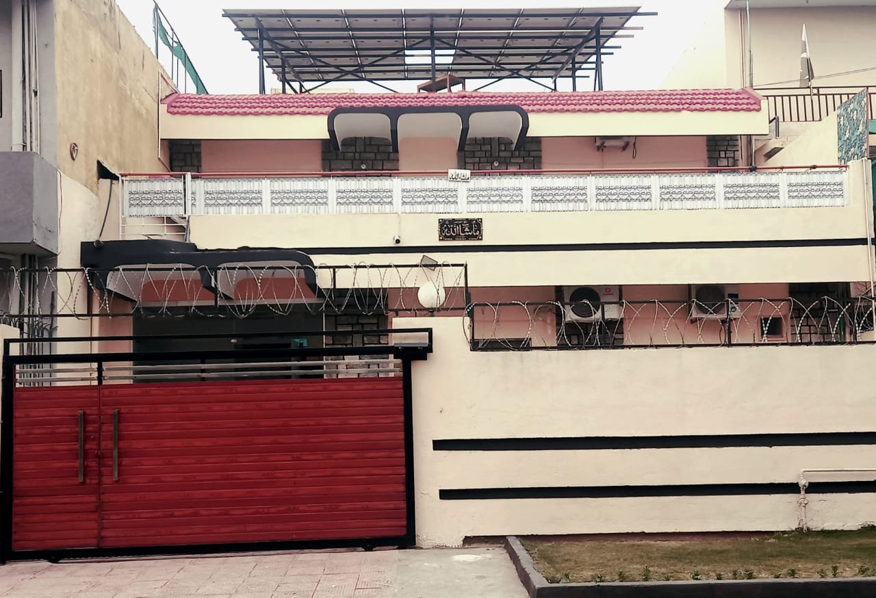Street entrance of New Palace Guest House on Street 55, G-9/4 Islamabad