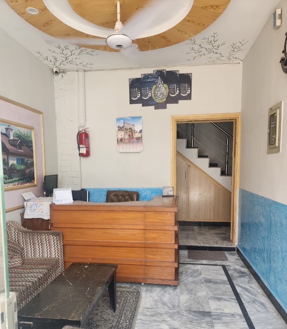 Reception and guest seating area at New Palace Guest House Islamabad